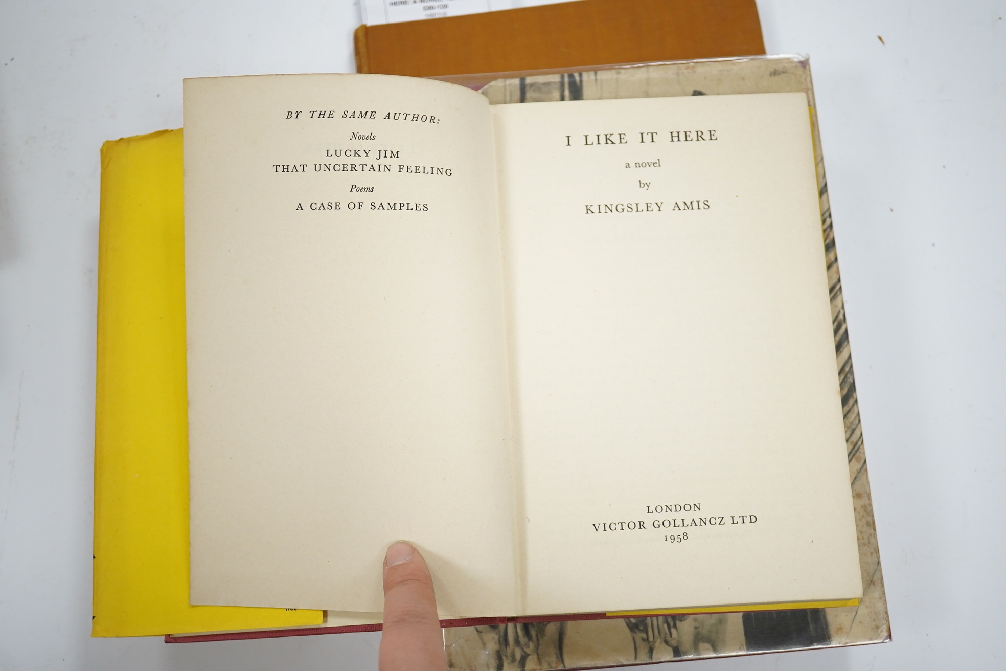 Amis, Kingsley - I Like It Here: a novel. 1st Edition. half title; publisher's cloth and d/wrapper. Victor Gollancz, 1958; Isherwood, Christopher - The Condor and the Cows. 1st Edition.